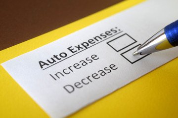 Obraz premium One person is answering question about auto expenses.