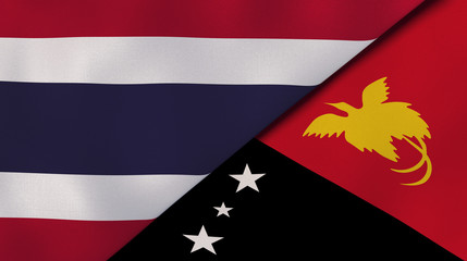 The flags of Thailand and Papua New Guinea. News, reportage, business background. 3d illustration