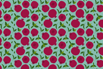 Pomegranate fruit and leaves pattern on green background.