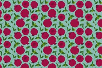 Pomegranate fruit and leaves pattern on green background.