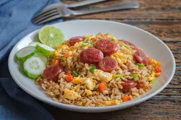 Fried rice with chinese sausage on plate
