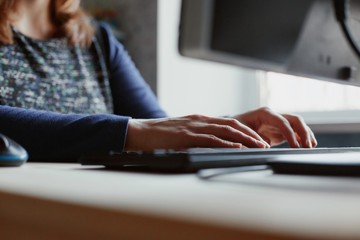 Coronavirus. Woman at the home office. Home working with computer. Working from home. In quarantine