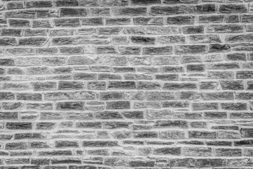 Mur en pierre noir et blanc