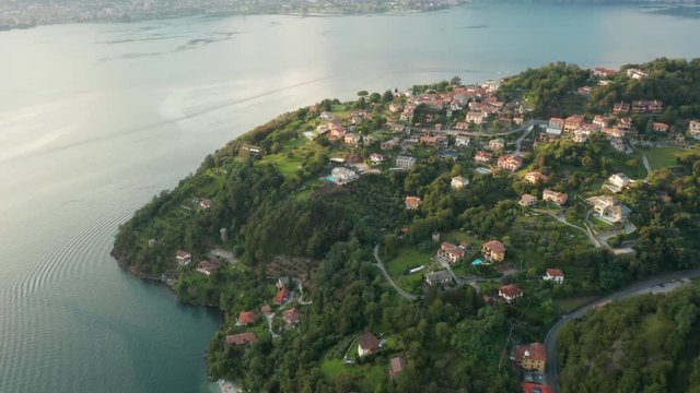 Aerial view of a small village with traditional colorful italian houses, Olgiasca, Italy
