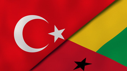 The flags of Turkey and Guinea Bissau. News, reportage, business background. 3d illustration
