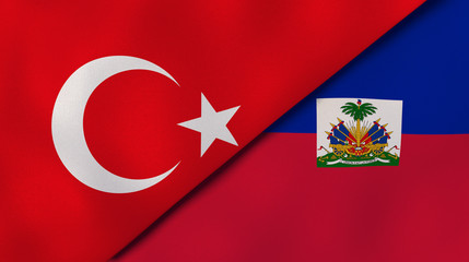 The flags of Turkey and Haiti. News, reportage, business background. 3d illustration