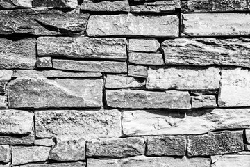 Mur en pierre noir et blanc