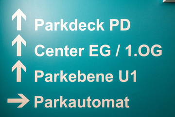 Blue german parking deck sign showing different levels