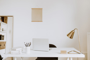 Modern minimal interior design concept. Bright Scandinavian home office desk table workspace with...