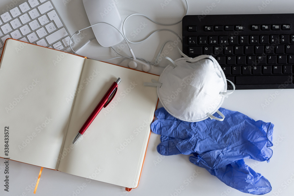 Fototapete medical mask and gloves on the desktop. remote work and study. notepad with place for text and pen f
