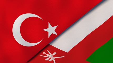 The flags of Turkey and Oman. News, reportage, business background. 3d illustration