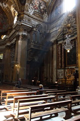 A ray of sunshine illuminates the interior of the cathedral in Rome