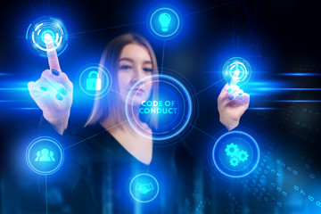 Business, Technology, Internet and network concept. Young businessman working on a virtual screen of the future and sees the inscription: Code of conduct