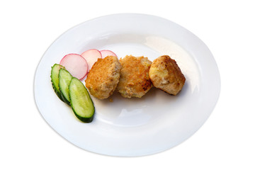 fish cakes with chopped cucumber and radish on a white plate without a background for your design or menu