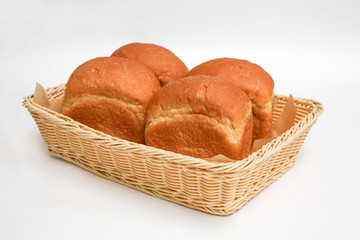 white bread in basket white background