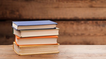 Stack of school books, education and learning concept