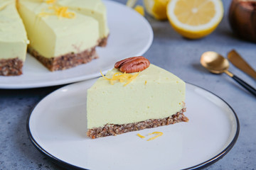 Homemade lemon raw vegan cake - healthy dessert made from coconut milk, butter, cashew, if-if