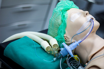 equipment and medical devices in modern operating room take and model the wounded.