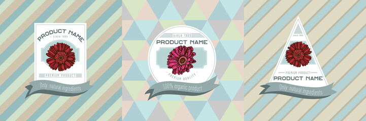 Three colored labels with illustration of gerbera