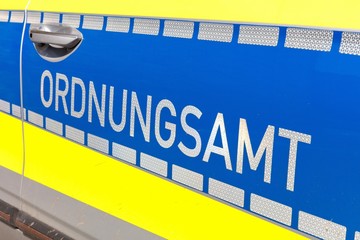 lettering at patrol car of German Ordnungsamt (translation: order enforcement office)