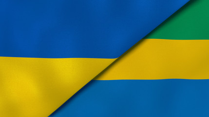 The flags of Ukraine and Gabon. News, reportage, business background. 3d illustration