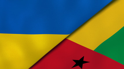The flags of Ukraine and Guinea Bissau. News, reportage, business background. 3d illustration
