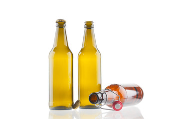 Empty beer bottles isolated on white background