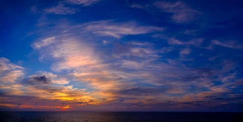 Naklejka na ściany i meble Sunset colours in Atlantic Ocean
