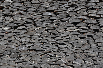 Firewood in a woodpile, vintage texture. Chipped firewood as a background