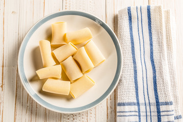 paccheri on plate with rolling pin