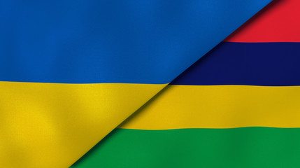The flags of Ukraine and Mauritius. News, reportage, business background. 3d illustration