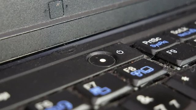 Laptop power button. Wi-Fi and computer drive indicators