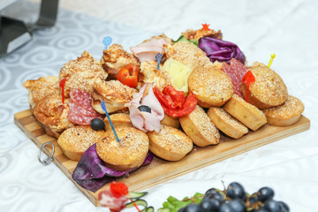 Decorated food on table prepared for wedding guests