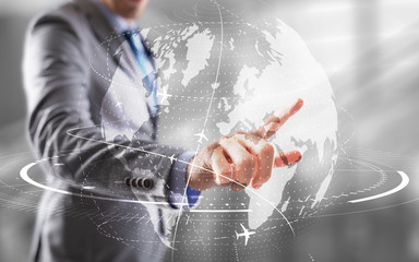 Fototapeta na wymiar Businessman touching 3D globe. Network and data exchanges over the world.