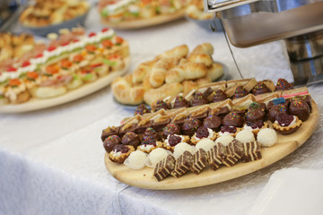 Decorated food on table prepared for wedding guests