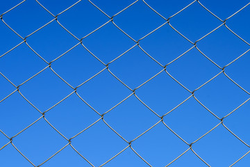 fence barricades in back background