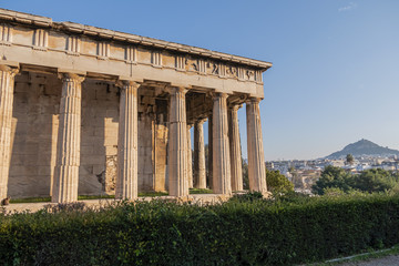 Fototapeta premium Temple of Hephaestus (Hephaisteion) - well-preserved Greek temple. Temple of Hephaestus is Doric peripheral temple; located at north-west side of Athens Agora on top of Agoraios Kolonos hill. Greece.