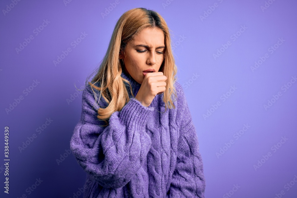 Sticker Young beautiful blonde woman wearing casual turtleneck sweater over purple background feeling unwell and coughing as symptom for cold or bronchitis. Health care concept.