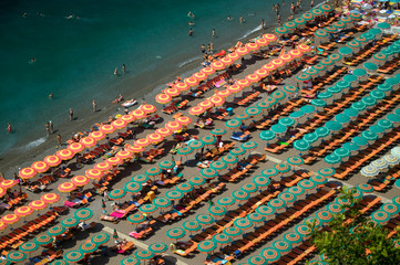 Elevated pattern view of famous beach umbrellas of Amalfi, a town in the province of Salerno, in...