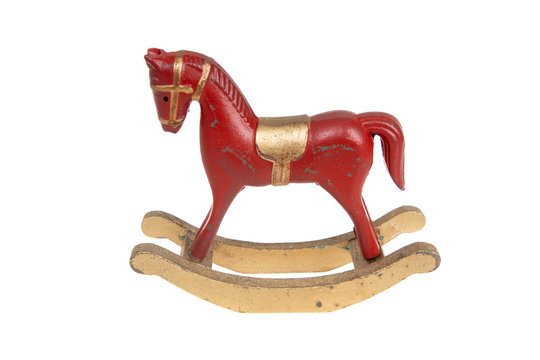 Red vintage rocking horse, isolated on white