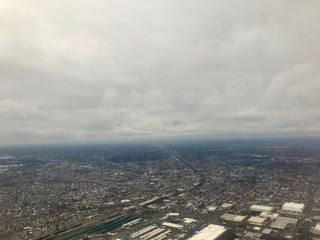 Aerial birds eye view of Elizabeth & Newark, New Jersey (United States of America) close to EWR airport: Urban downtown, highway & turnpike transportation, busy industrial cityscape around the port