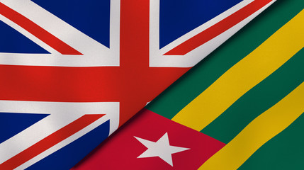 The flags of United Kingdom and Togo. News, reportage, business background. 3d illustration