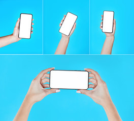 Set of smartphones in hands isolated on blue background.