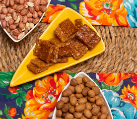 top view of three bowls full of peanuts candies on the straw table