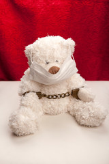 image of toy wool bear mask handcuff 