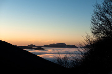 Italy, fog at sunset on the Apennines