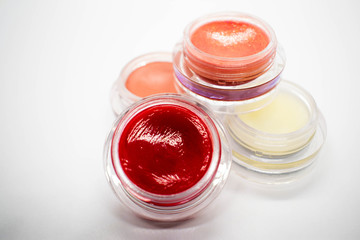 Pots of glossy, shiny and bright makeup products