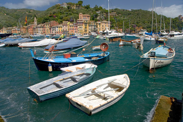 Obraz premium View of Portofino's Riviera di Levante and it's colorful buildings and harbor, a small Italian fishing village in the province of Genoa on the Italian Riviera on the Mediterranean Sea, Italy, Europe