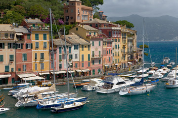 View of Portofino's Riviera di Levante and it's colorful buildings and harbor, a small Italian fishing village in the province of Genoa on the Italian Riviera on the Mediterranean Sea, Italy, Europe