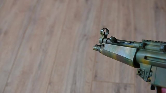 use of the loading lever of a submachine gun